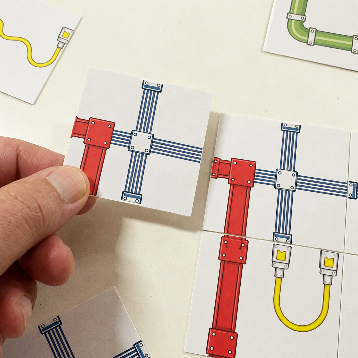 Circuit Sibz tile being positioned beside an existing connected tile grid.